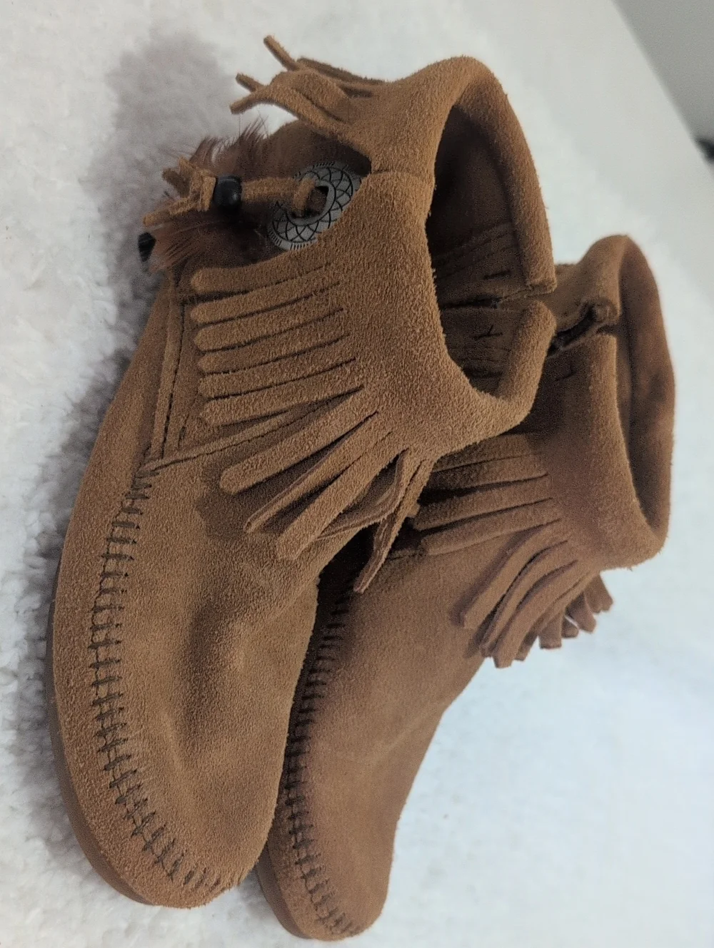 Minnetonka Kids Fringe Moccasins in Chestnut Brown